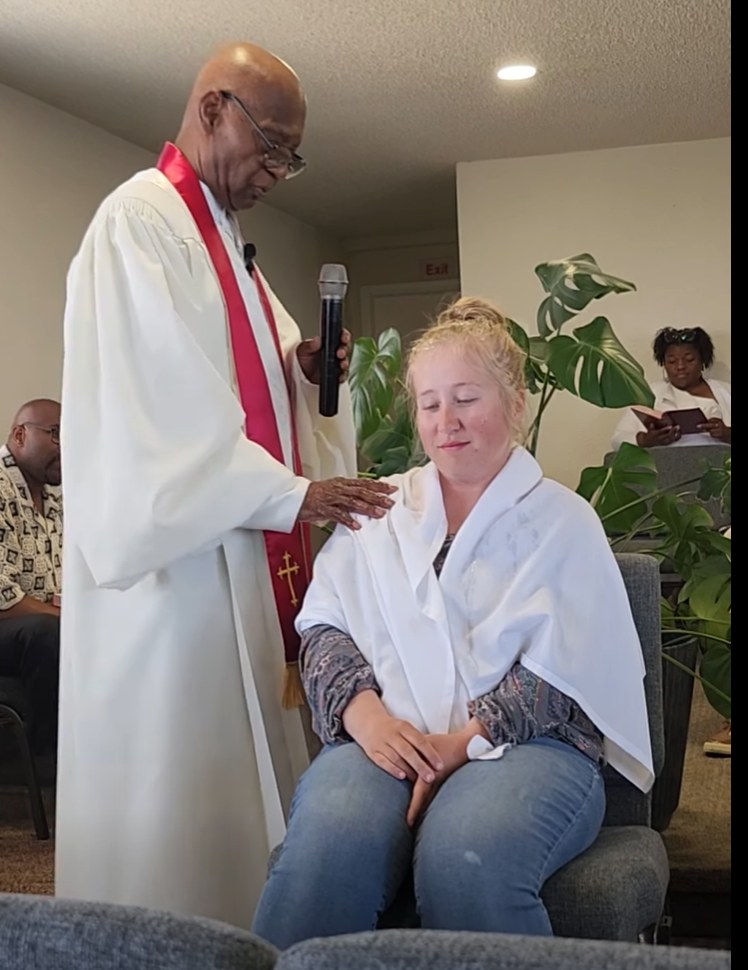 A baptism and prayer moment at Peoples United Methodist Church in Colorado Springs
